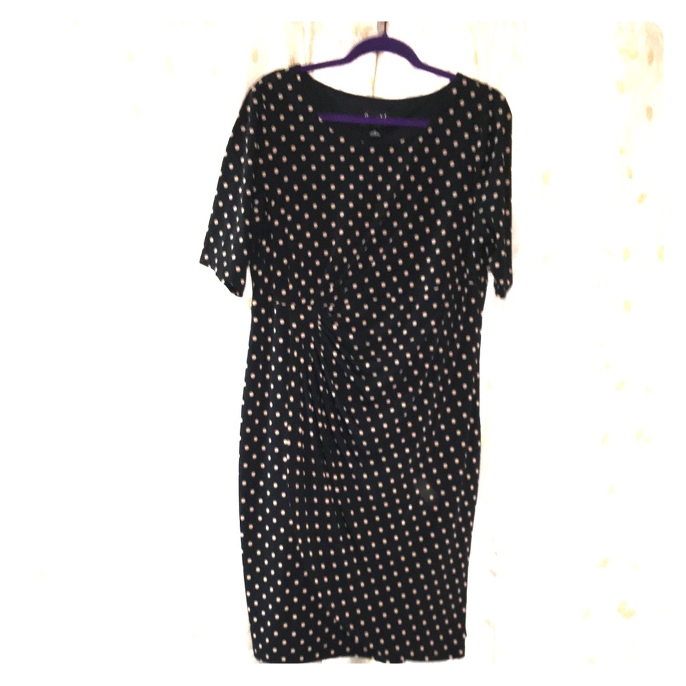 Faux wrap dress, ruching on side at the waist.